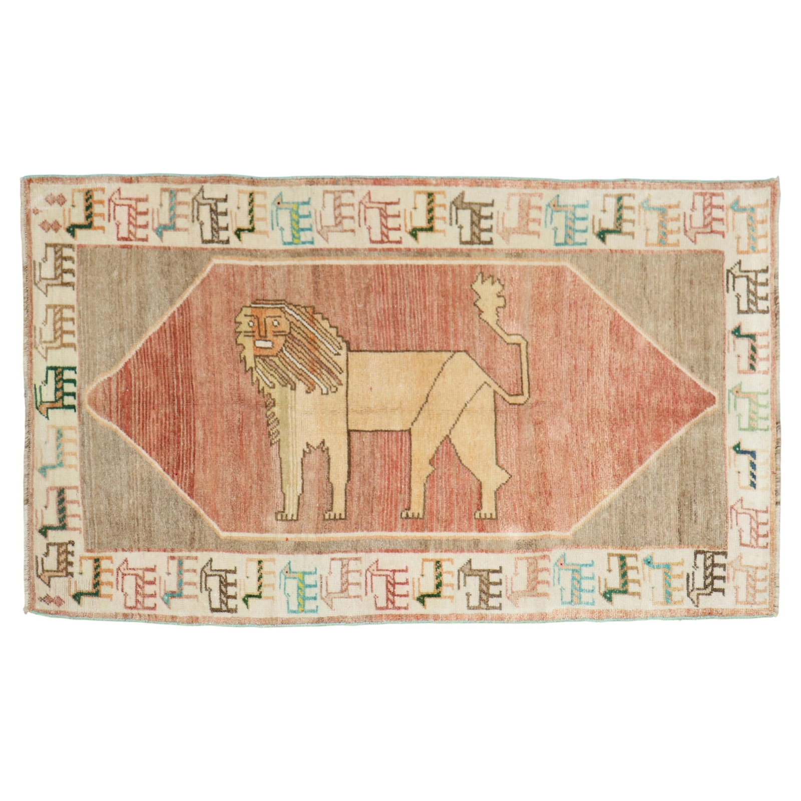Vintage Hand Knotted Wool Gabbeh Lion Motif Rug 43 in x 75 in: Vintage Hand Knotted Wool Gabbeh Lion Motif Rug 43 in x 75 in Vintage hand-knotted Gabbeh rug with a lion motif and tribal style. Made of wool and dating to 1940, this pre-owned rug is from the 20th c