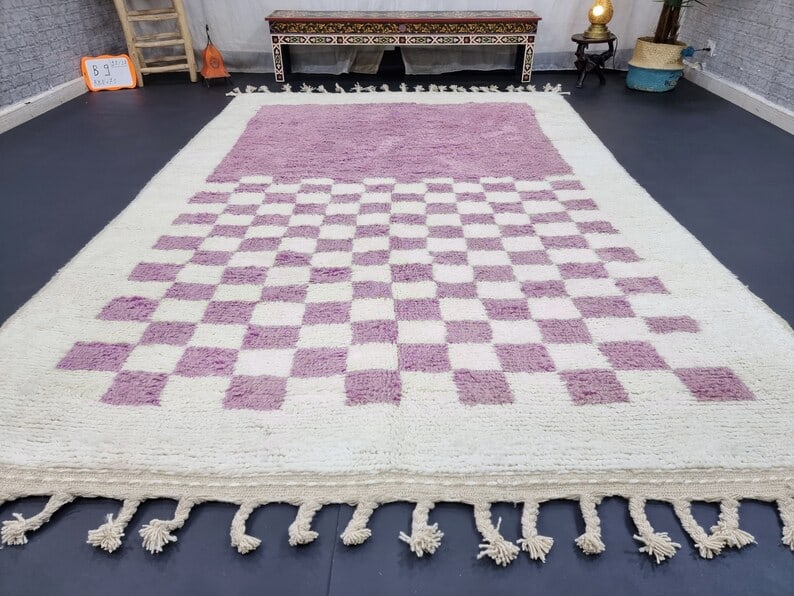 Luxury Handwoven 100% Wool Rug from Morocco 9 x 5 Feet: Luxury Handwoven 100% Wool Rug from Morocco 9 x 5 Feet Enhance your living space with this stunning Luxury Soft Handmade Wool Rug. Expertly handwoven in the Atlas Mountains by skilled local Berber wom