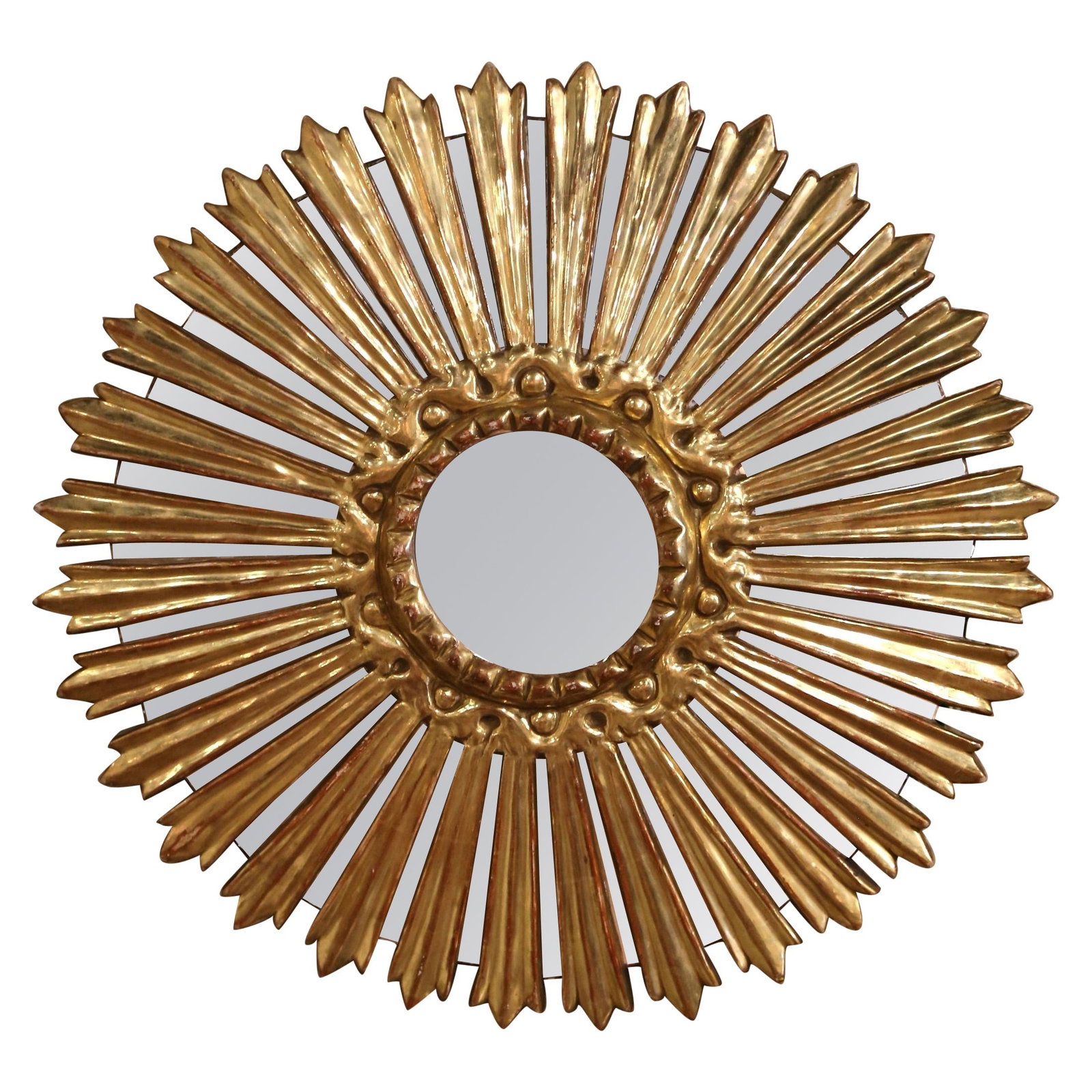 Italian Giltwood Sunburst Wall Mirror with Radiating Mirrored Rays: Italian Giltwood Sunburst Wall Mirror with Radiating Mirrored Rays This vintage mid-century Italian sunburst wall mirror features a hand-carved giltwood frame with a rich gilt painted finish. Crafted 