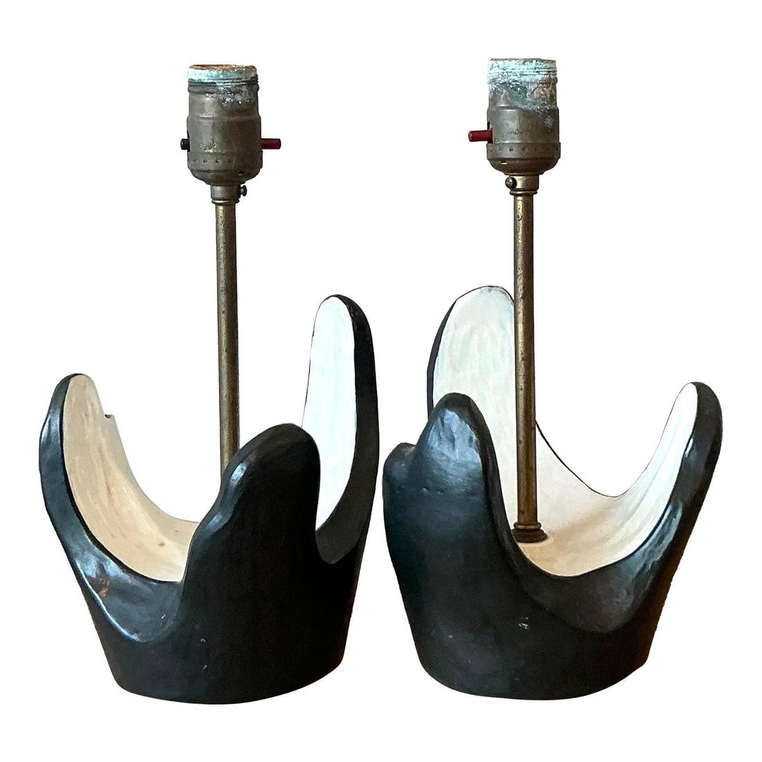 Pair of Mid-Century Modern Abstract Plaster Table Lamps: Pair of Mid-Century Modern Abstract Plaster Table Lamps This pair of Mid-Century Modern table lamps features abstract, free-form plaster bases with a dark exterior finish and contrasting white interio