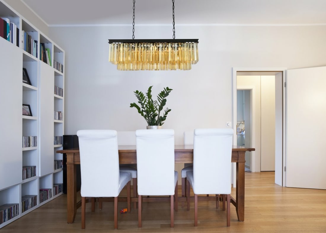 Sydney 12-Light Matte Black Crystal Chandelier 40 inch: Sydney 12-Light Matte Black Crystal Chandelier 40 inch This modern chandelier features a matte black frame paired with golden teak (smoky) royal cut crystals, creating a striking and elegant lighting 