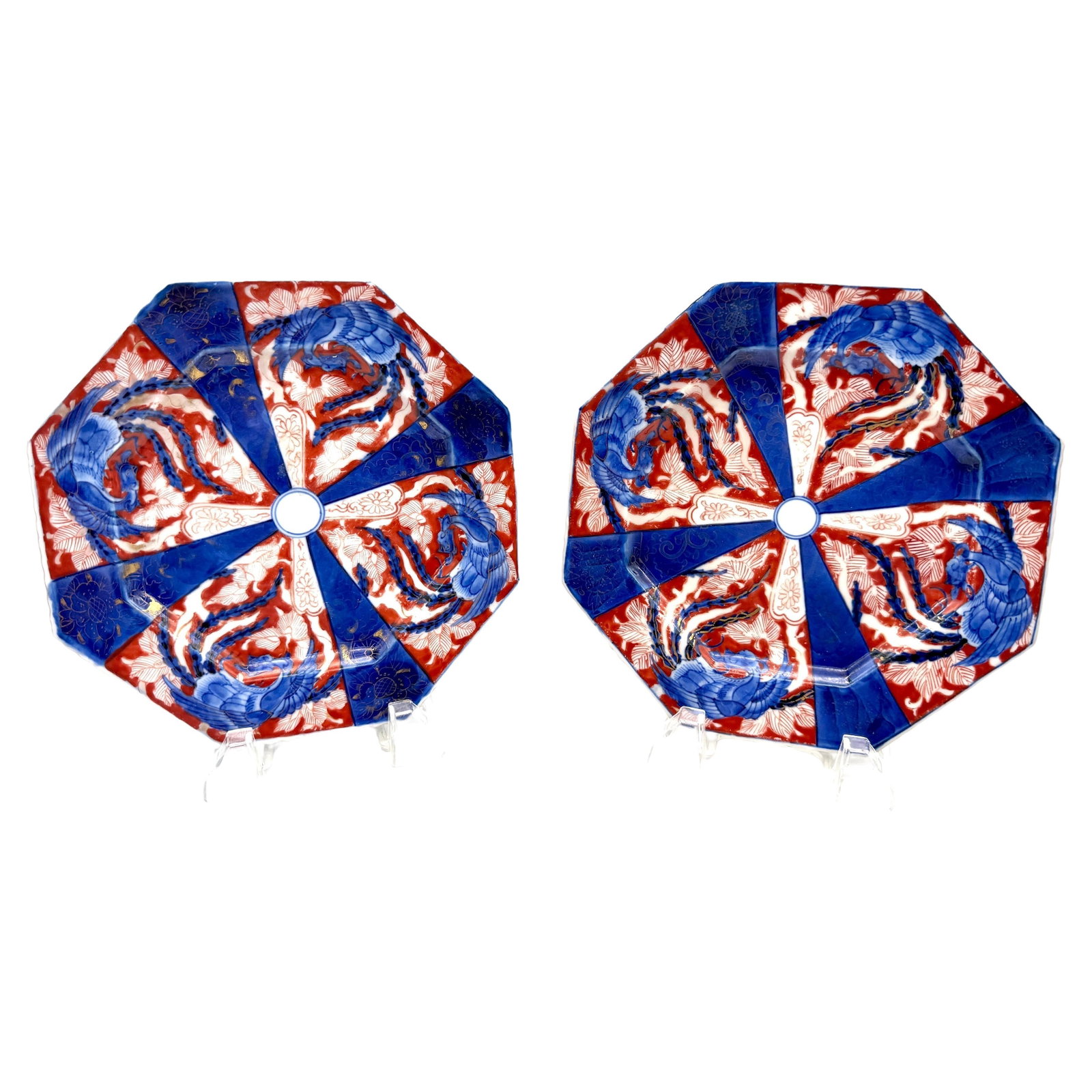 Set of 2 Meiji Period Fukagawa Octagonal Plates with Phoenix Motif: Set of 2 Meiji Period Fukagawa Octagonal Plates with Phoenix Motif Discover a striking pair of Meiji Period Fukagawa octagonal plates, each measuring 8.25 inches in diameter. These exquisite pieces, a