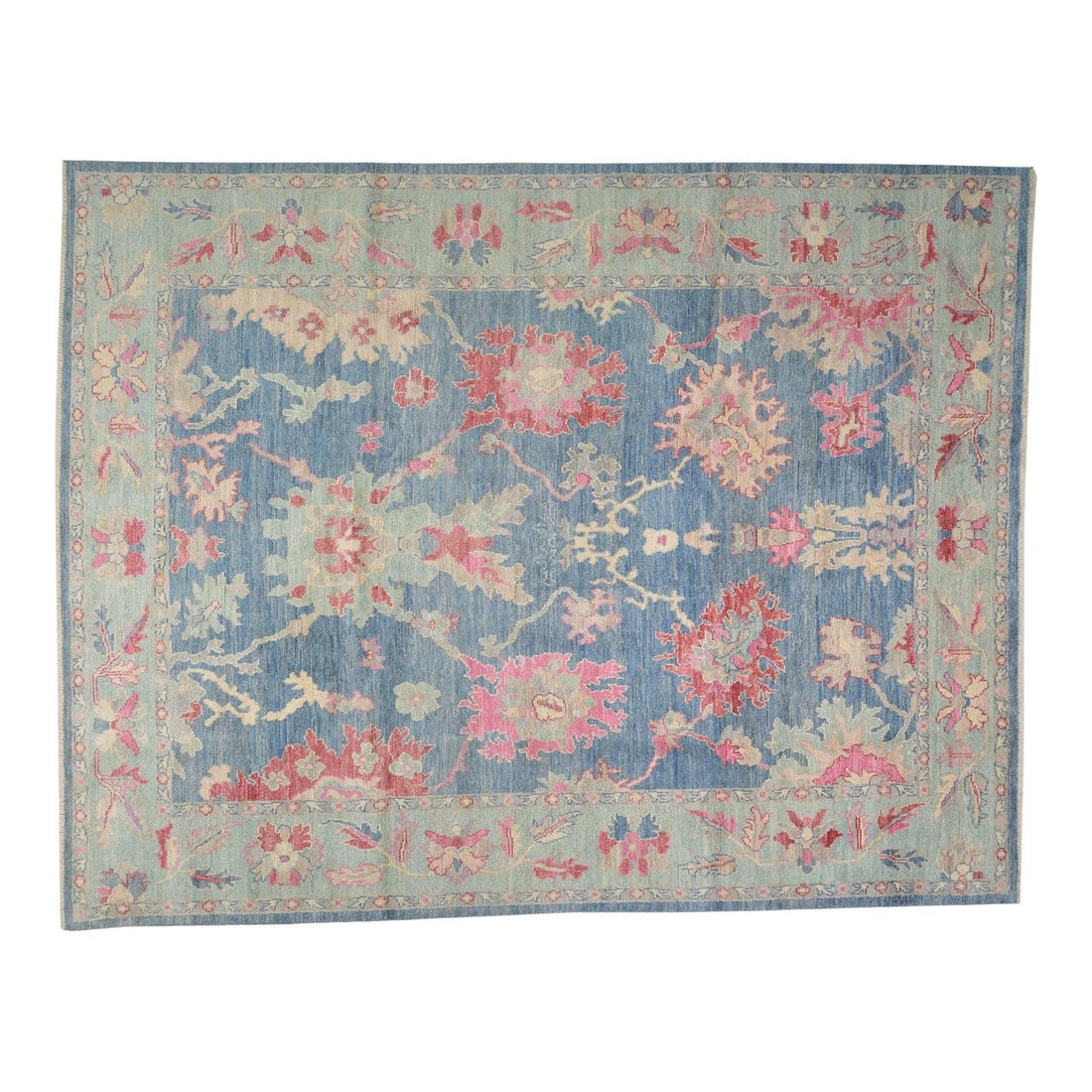9'5 x 12'5 Wool Oushak Rug Hand Knotted in Pakistan Blue: 9'5 x 12'5 Wool Oushak Rug Hand Knotted in Pakistan Blue This hand-knotted Oushak wool rug showcases traditional craftsmanship combined with a modern design sensibility. Expertly crafted by skilled ar