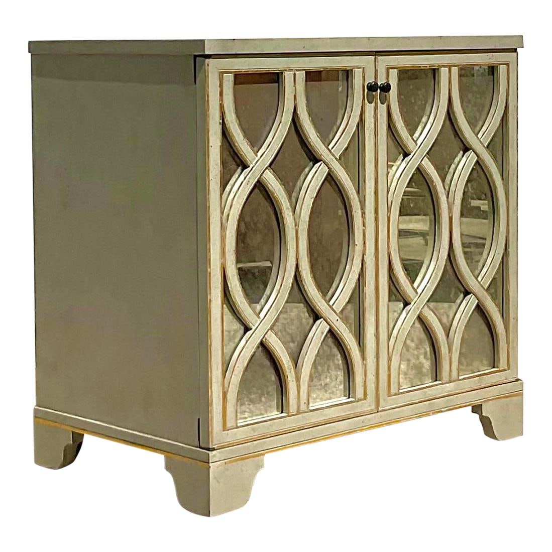 Vintage Regency Gilt Tipped Cabinet Greige Mirror Wood: Vintage Regency Gilt Tipped Cabinet Greige Mirror Wood Elevate your home decor with this Vintage Regency Gilt Tipped Cabinet. This exquisite piece showcases American craftsmanship and timeless Regency