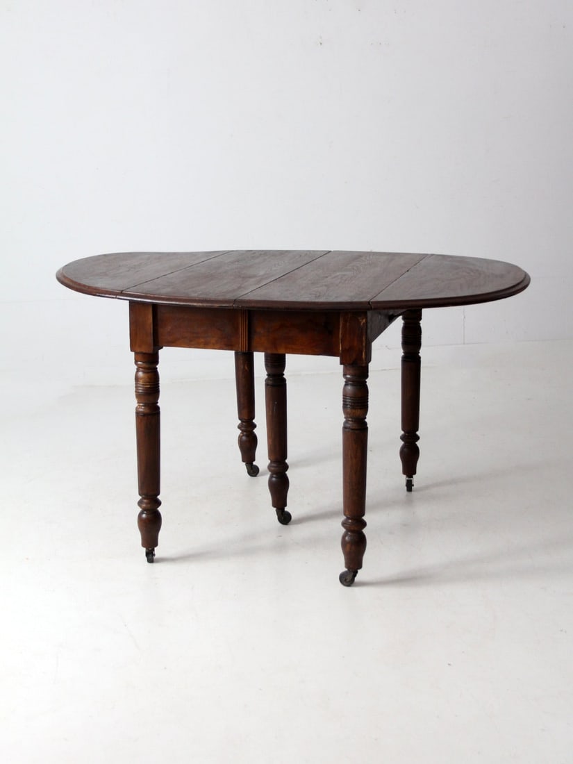 Antique Drop Leaf Dining Table with 2 Extensions and Casters - 12