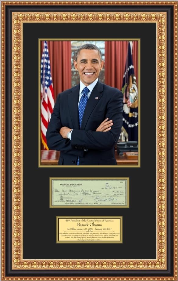Framed Barack Obama Check Reproduction with Presidential Portrait and Engraved Plaque: Framed Barack Obama Check Reproduction with Presidential Portrait and Engraved Plaque This custom-framed display features a facsimile signed check by President Barack Obama, accompanied by a large 11"
