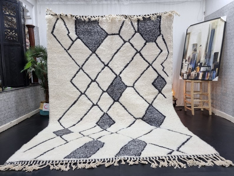 Handmade Moroccan Berber Wool Rug Soft White Black Engraved 9.84 x 6.56 Feet: Handmade Moroccan Berber Wool Rug Soft White Black Engraved 9.84 x 6.56 Feet This stunning Soft White and Black Handmade Moroccan Berber Wool Rug features a beautifully engraved pattern, making it a s