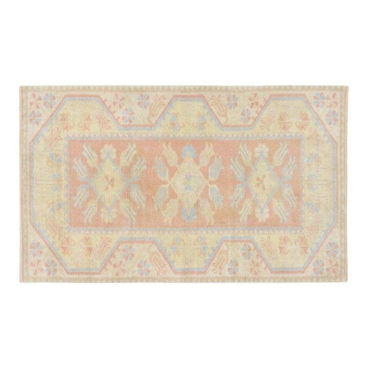 Vintage Anatolian Wool Rug 2'7x4'4 Pink: Vintage Anatolian Wool Rug 2'7x4'4 Pink This vintage Turkish Anatolian rug is hand-knotted from wool using traditional techniques, showcasing a blend of timeless artistry and modern design sensibiliti