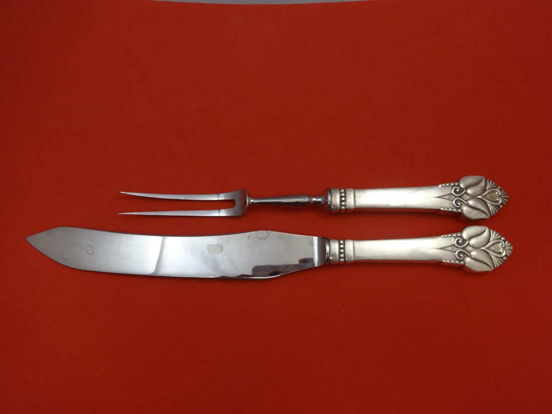 Greta Sterling Silver Roast Carving Set by Orla Vagn Mogensen 2pc: Greta Sterling Silver Roast Carving Set by Orla Vagn Mogensen 2pc This exquisite roast carving set features a stunning design by Orla Vagn Mogensen, crafted from high-quality sterling silver with a ho