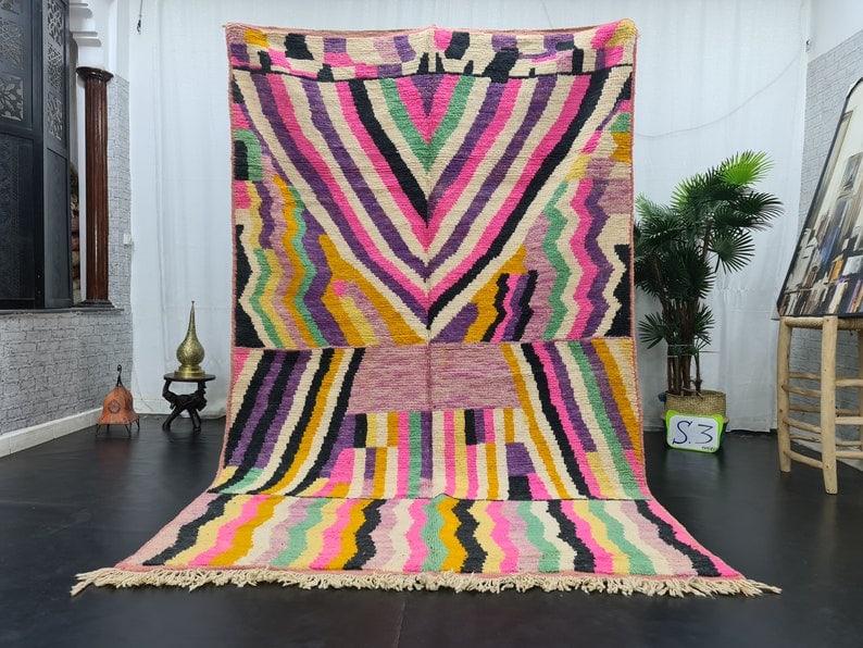Authentic Handwoven Colorful Rug 8 x 5 Feet from Morocco: Authentic Handwoven Colorful Rug 8 x 5 Feet from Morocco Discover the beauty of this authentic handwoven colorful rug, crafted in the Atlas Mountains by skilled Berber women weavers. This stunning pie