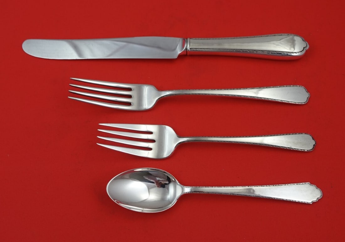 International Sterling Silver Windemere 4-Piece Place Setting: International Sterling Silver Windemere 4-Piece Place Setting Enhance your dining experience with this elegant 4-piece place setting in the Windemere pattern by International. Crafted from high-qualit