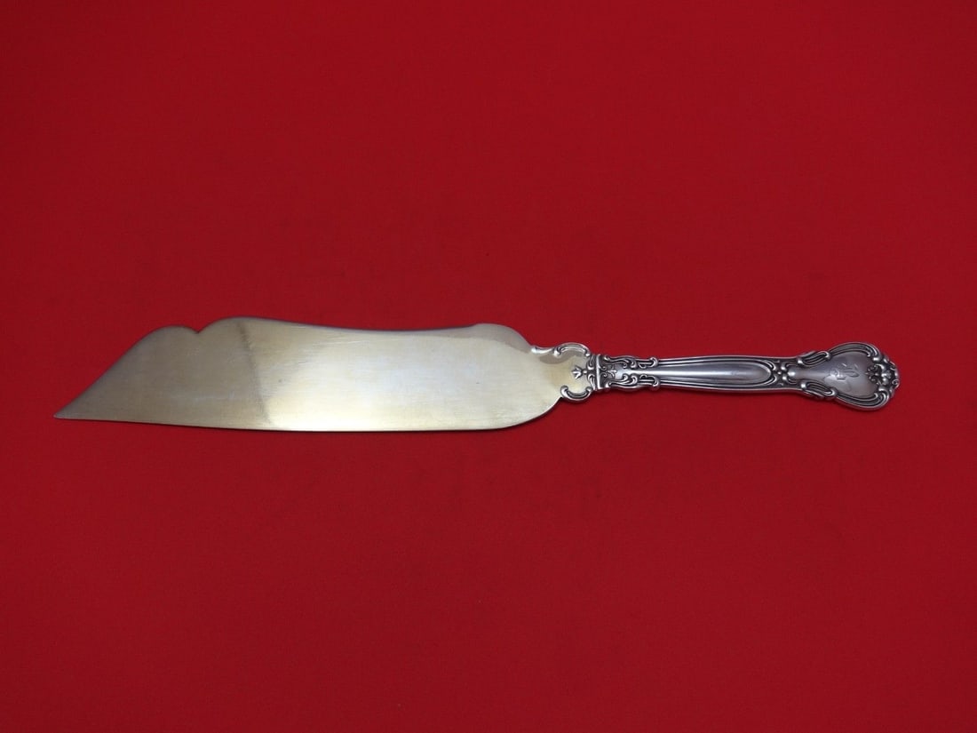 Gorham Chantilly Sterling Silver Goldwashed Ice Cream Slice 10 1/4": Gorham Chantilly Sterling Silver Goldwashed Ice Cream Slice 10 1/4" Elevate your dessert service with this exquisite ice cream slice from the Chantilly pattern by Gorham. Crafted from high-quality ste