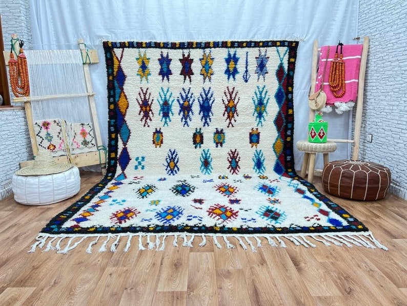 Authentic Handmade Wool Rug 10 x 6.56 Feet from Morocco: Authentic Handmade Wool Rug 10 x 6.56 Feet from Morocco Experience the luxury of this Elegant Soft Handmade Wool Rug, meticulously crafted by local Berber women weavers in the Atlas Mountains of Moroc