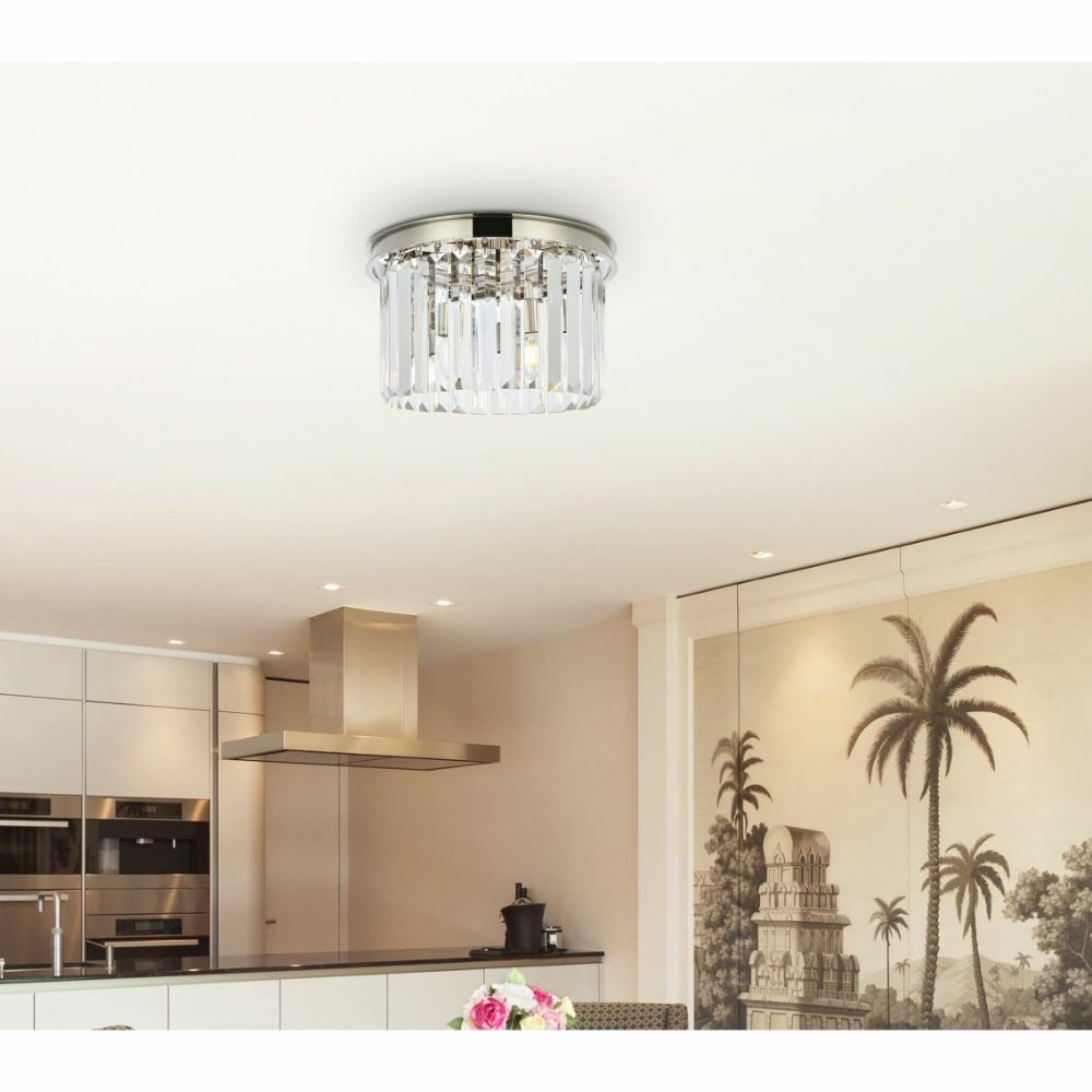 Sydney 3 Light Crystal Flush Mount Polished Nickel 16 inch: Sydney 3 Light Crystal Flush Mount Polished Nickel 16 inch This contemporary flush mount chandelier from the Sydney Collection features a polished nickel finish and high-quality royal cut clear crysta