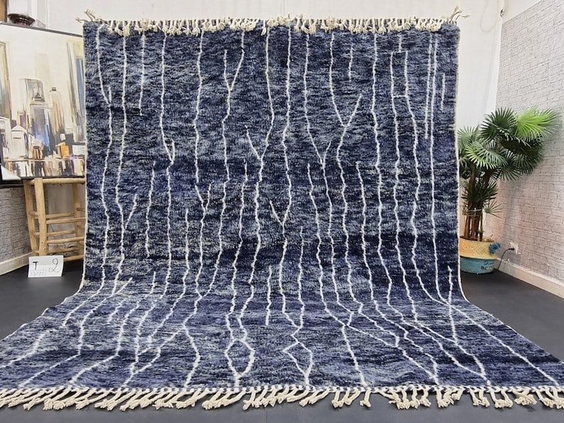 Handwoven Elegant Soft Rug 100% Sheep Wool Morocco 10 x 6.56 Feet: Handwoven Elegant Soft Rug 100% Sheep Wool Morocco 10 x 6.56 Feet Discover the charm of this elegant, handwoven soft rug, crafted by local Berber women weavers in the Atlas Mountains of Morocco. Made 