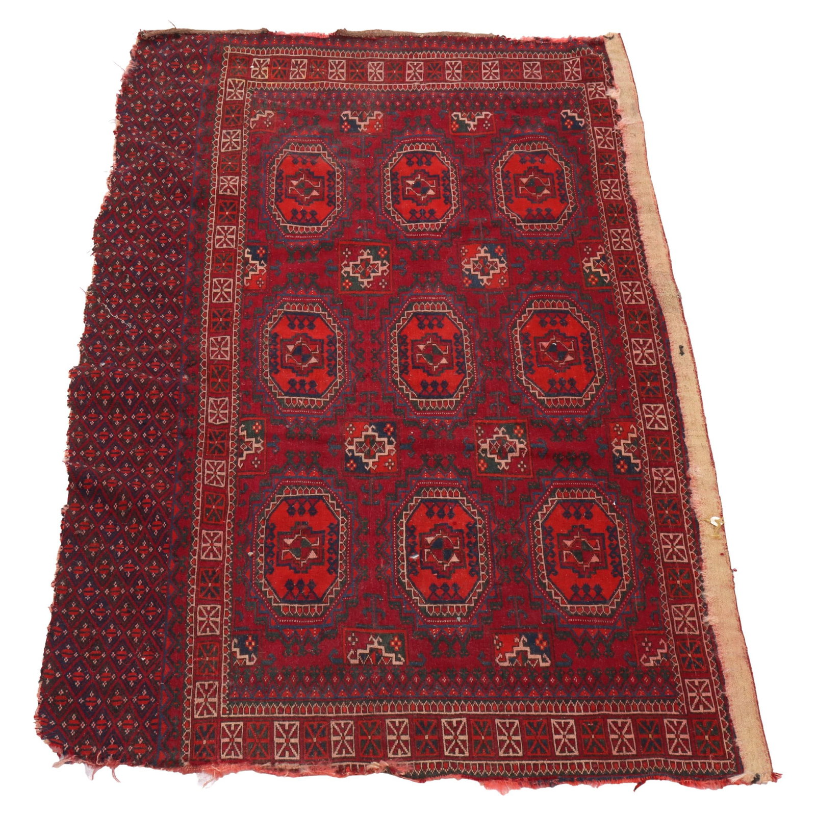 Antique Persian Tekke Wool Rug 53.5 x 29.25 C1930: Antique Persian Tekke Wool Rug 53.5 x 29.25 C1930 This antique Persian Tekke wool rug, crafted circa 1930, showcases traditional Tekke motifs and a striking rich red color palette. It features intrica