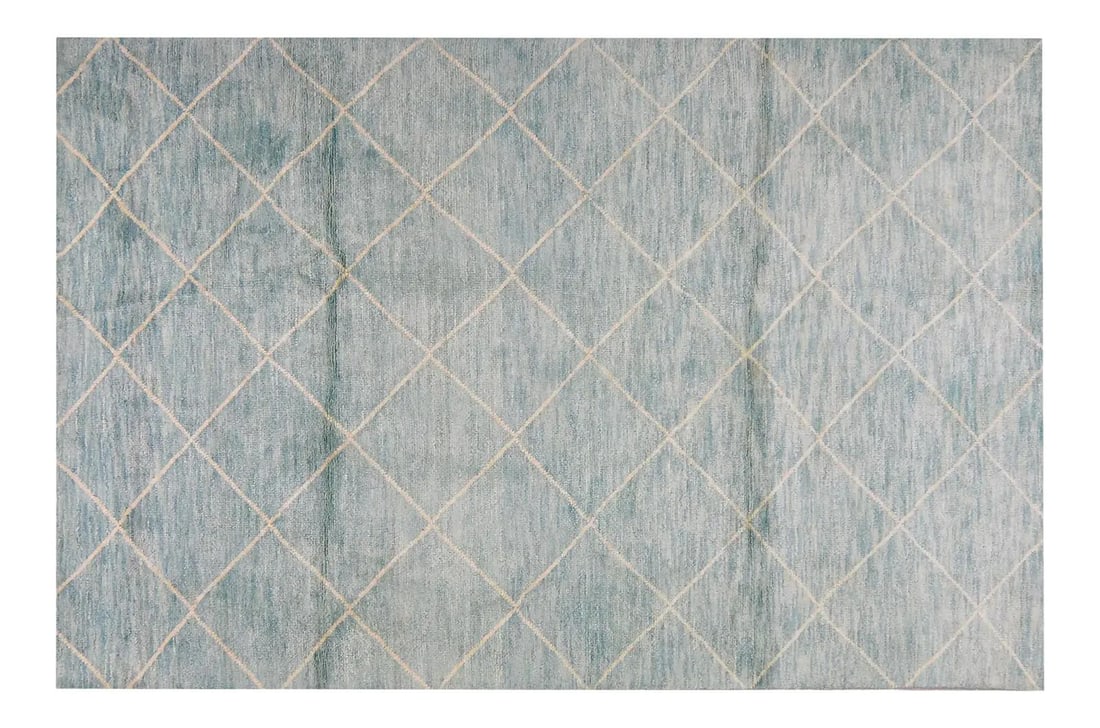 5'7" x 8'5" Beni Ourain Wool Rug in Natural Blue Tones: 5'7" x 8'5" Beni Ourain Wool Rug in Natural Blue Tones This Moroccan Beni Ourain rug features a hand-knotted design crafted from natural color organic wool. The rug has a contemporary style and a soft