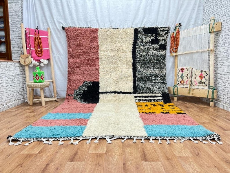 Authentic Handwoven Colorful Rug 100% Sheep Wool Morocco: Authentic Handwoven Colorful Rug 100% Sheep Wool Morocco Enhance your space with this lovely authentic colorful rug, handwoven by skilled Berber women in the Atlas Mountains of Morocco. Crafted using 