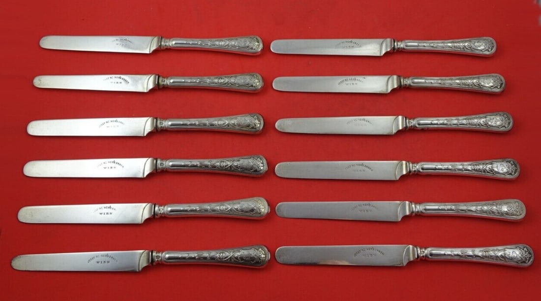 Josef Reiner 12pc .800 Silver Knife Set with Silverplate Blades 8 1/4": Josef Reiner 12pc .800 Silver Knife Set with Silverplate Blades 8 1/4" This exquisite 12-piece knife set by Josef Reiner features a stunning design crafted from .800 silver with hollow handles and sil