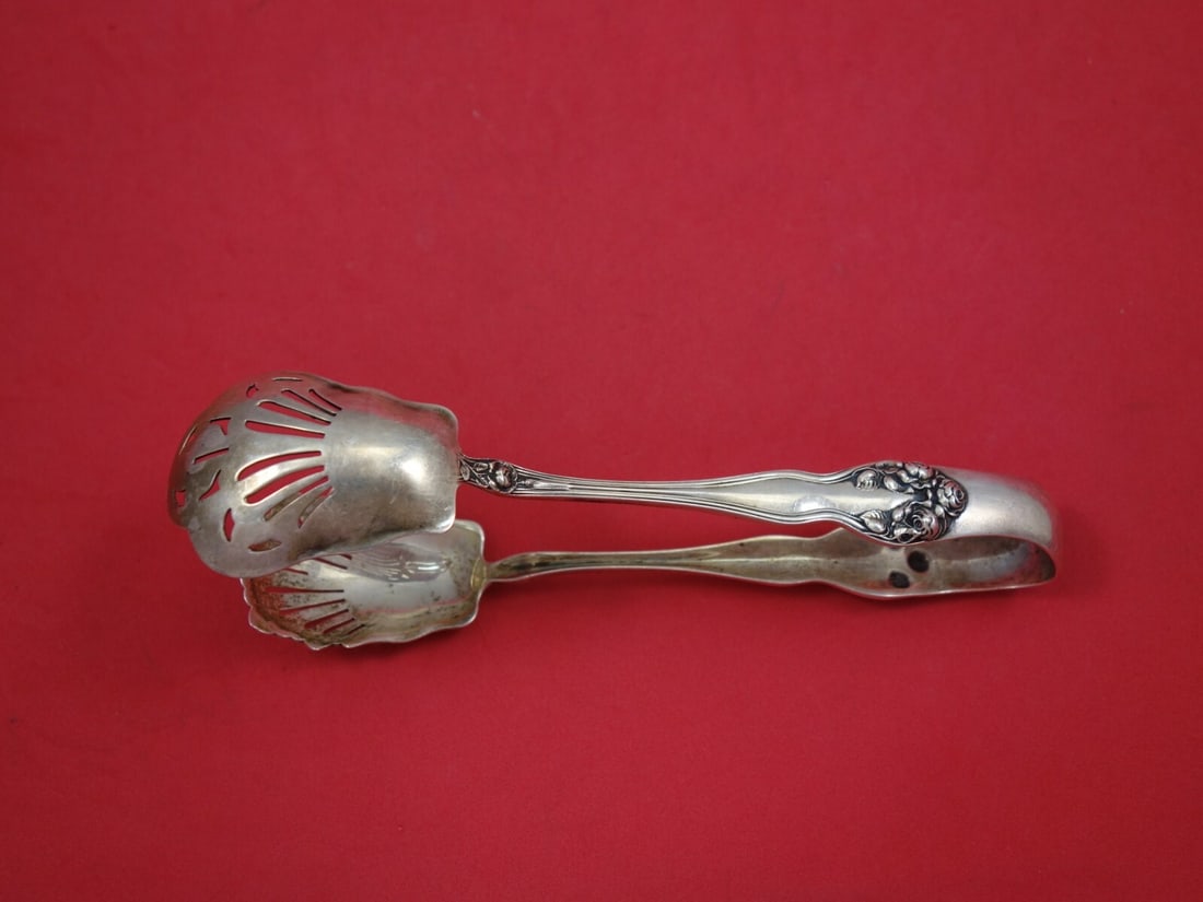 Wallace Wedding Rose Sterling Silver Ice Tong 6.75" Serving: Wallace Wedding Rose Sterling Silver Ice Tong 6.75" Serving Experience the elegance of the early 20th century with this exquisite Sterling Silver Ice Tong. Crafted by Wallace in the beautiful Wedding 