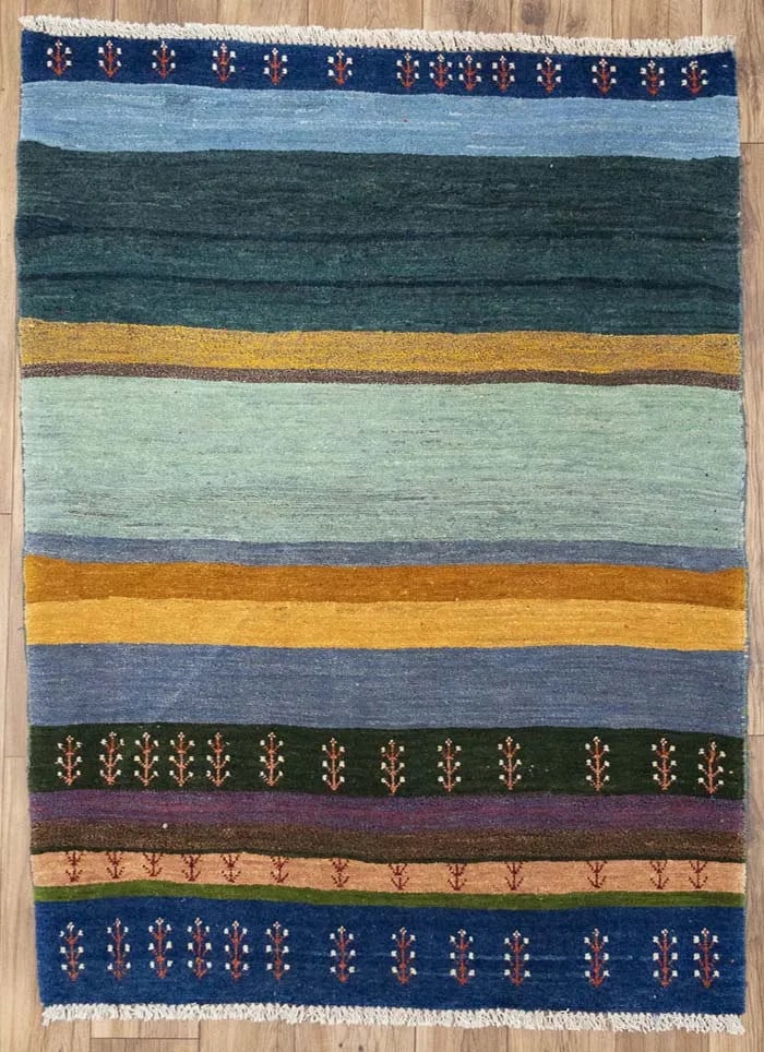 Hand-Knotted Wool Tribal Striped Area Rug 3'7 x 4'9: Hand-Knotted Wool Tribal Striped Area Rug 3'7 x 4'9 This vintage handmade Oriental rug features a multicolored striped pattern and is crafted from high-quality wool using a hand-knotted technique. Mea