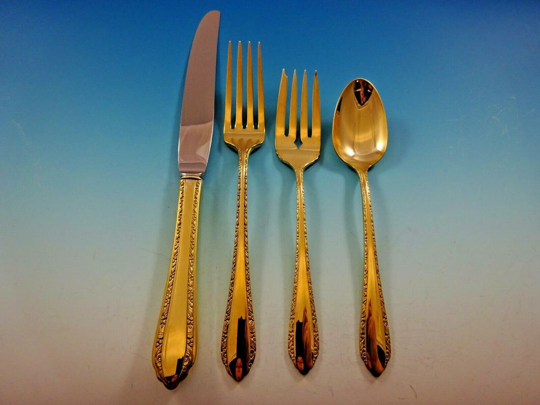 Royal Crest Wild Flower Vermeil Sterling Silver 4-Piece Place Setting: Royal Crest Wild Flower Vermeil Sterling Silver 4-Piece Place Setting Elevate your dining experience with this exquisite 4-piece place setting in the Wild Flower Vermeil pattern by Royal Crest. Crafte