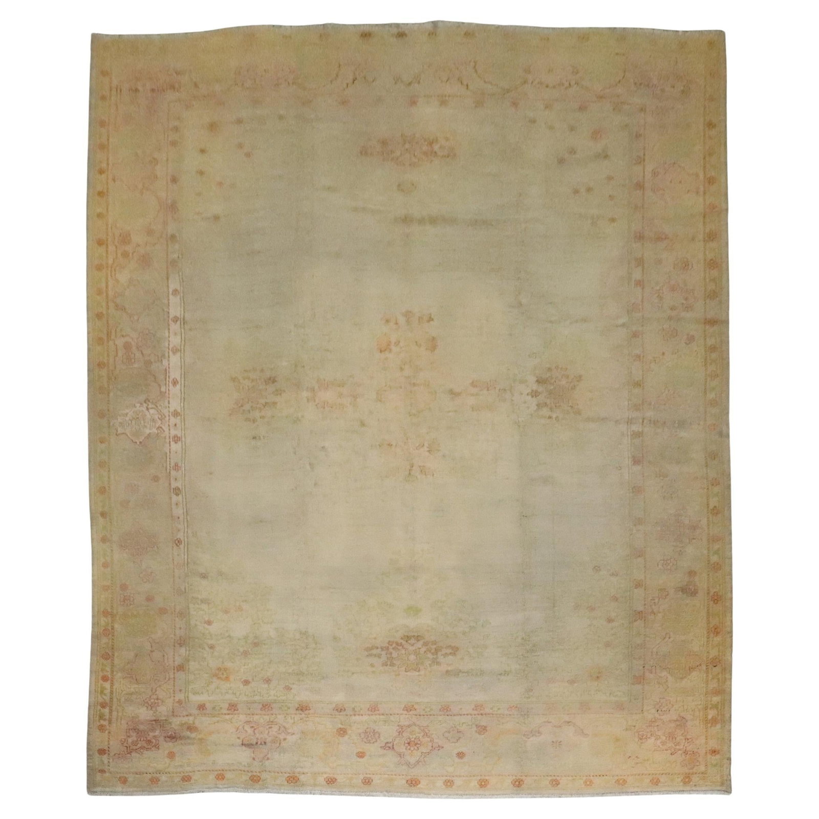 Antique Turkish Oushak Wool Rug Silver Gray 11'3 x 15': Antique Turkish Oushak Wool Rug Silver Gray 11'3 x 15' This is a large, late 19th-century Turkish Oushak rug featuring a silvery gray field with accents in green, gold, and raspberry tones. Crafted fr