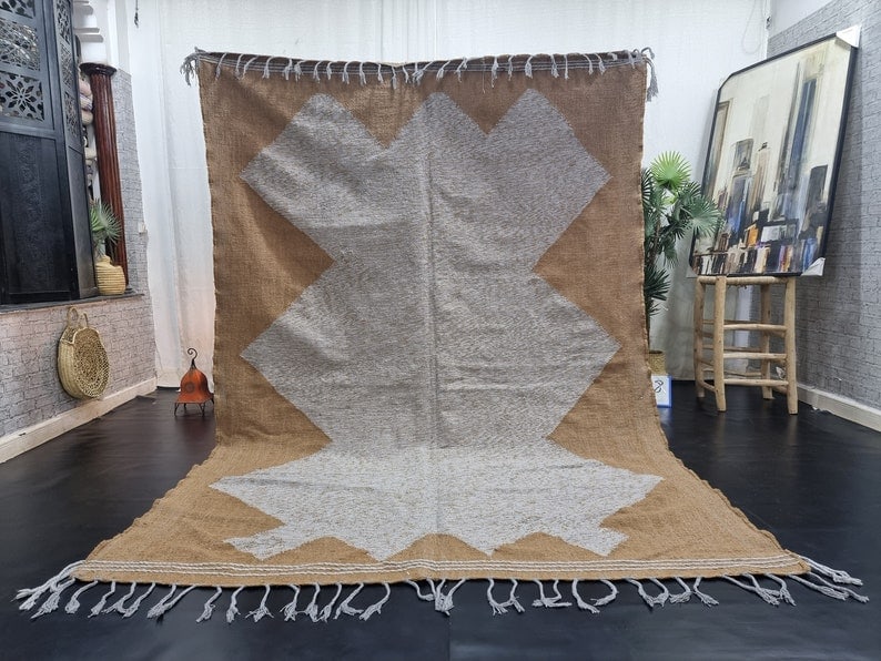 Handmade Moroccan Berber Rug 9.84 x 6.56 Feet Beige Brown Wool: Handmade Moroccan Berber Rug 9.84 x 6.56 Feet Beige Brown Wool Discover the beauty of this stunning Handmade Moroccan Berber Rug, meticulously crafted by skilled local Berber women weavers in the Atla