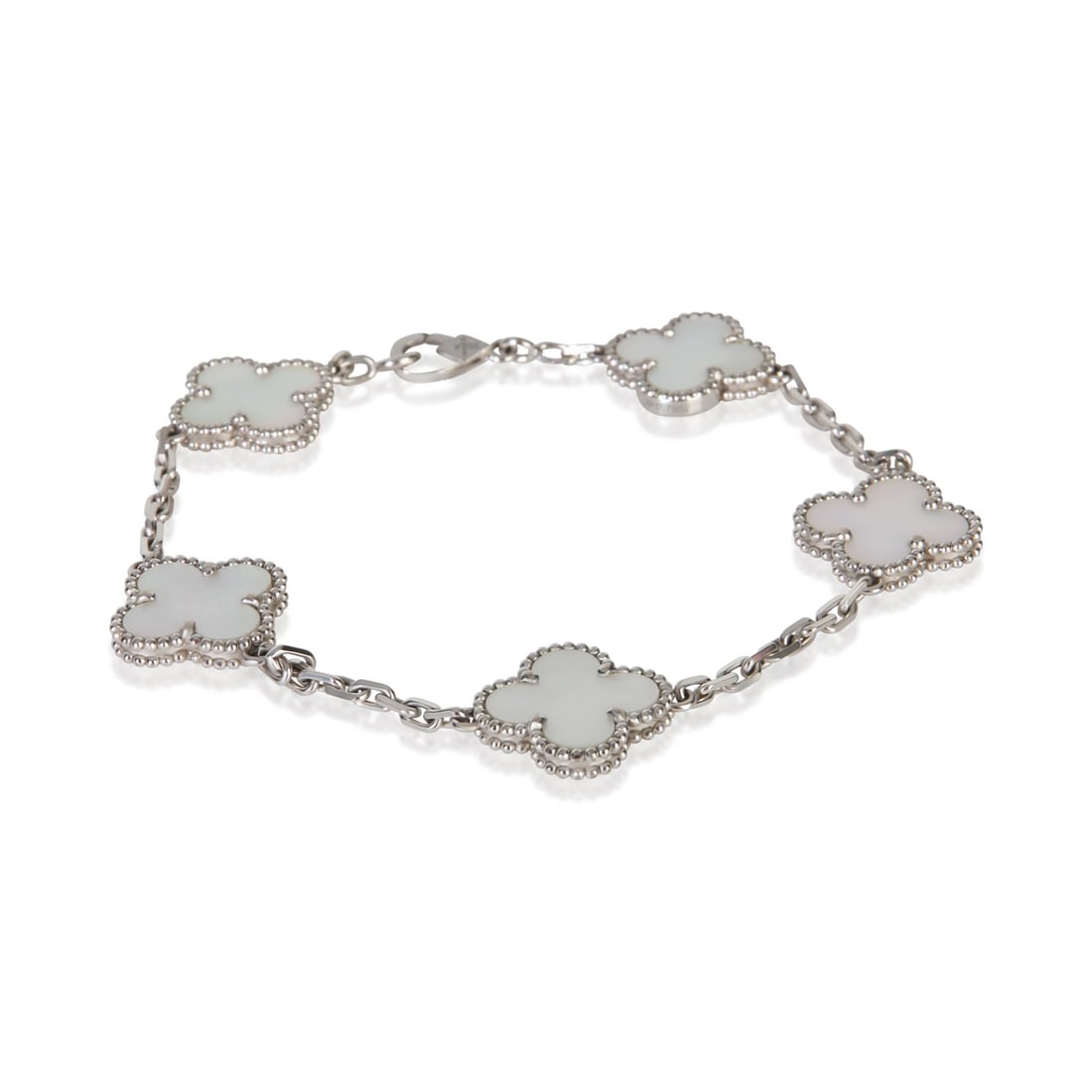 Van Cleef Arpels Vintage Alhambra white gold mother of pearl bracelet: Van Cleef Arpels Vintage Alhambra white gold mother of pearl bracelet This Van Cleef & Arpels Vintage Alhambra bracelet features elegant white gold paired with luminous mother of pearl. Designed for w