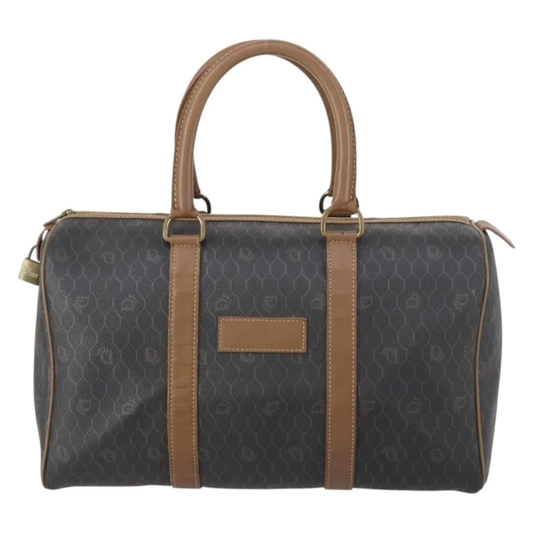 Black Canvas and Leather Boston Bag by Christian Dior Vintage: Black Canvas and Leather Boston Bag by Christian Dior Vintage This vintage Christian Dior Honeycomb Boston bag features black canvas and leather construction. It measures 37cm x 22cm x 20cm and is des