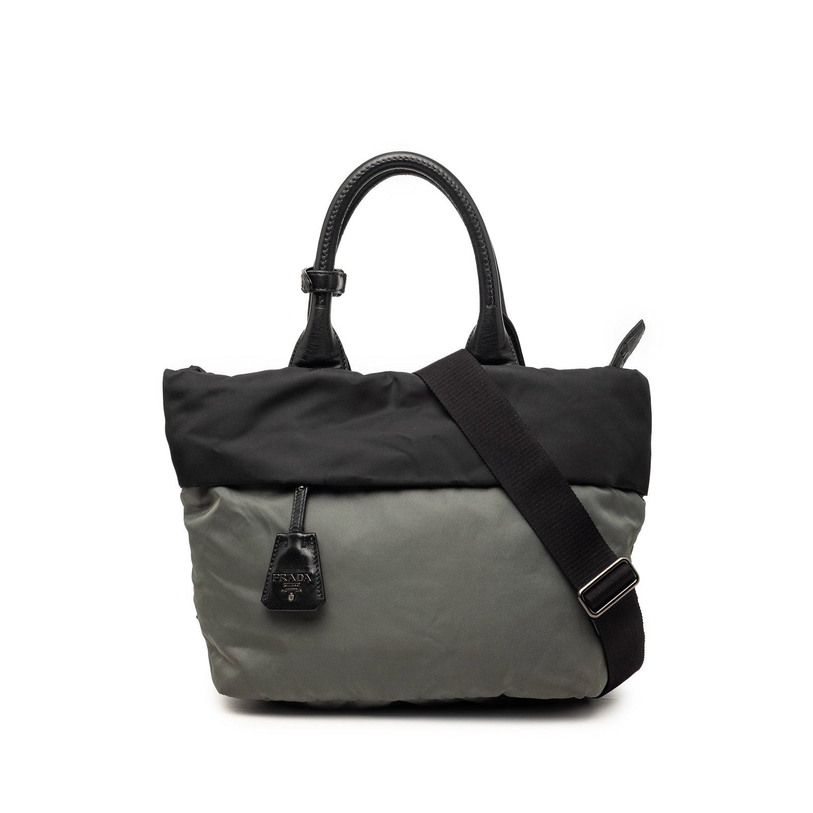 Prada Bicolor Tessuto Tote Bag Reversible Gray Nylon: Prada Bicolor Tessuto Tote Bag Reversible Gray Nylon Prada Bicolor Tessuto Reversible Tote crafted with a nylon body, rolled leather handles, and a removable nylon strap. The bag features a top zip cl