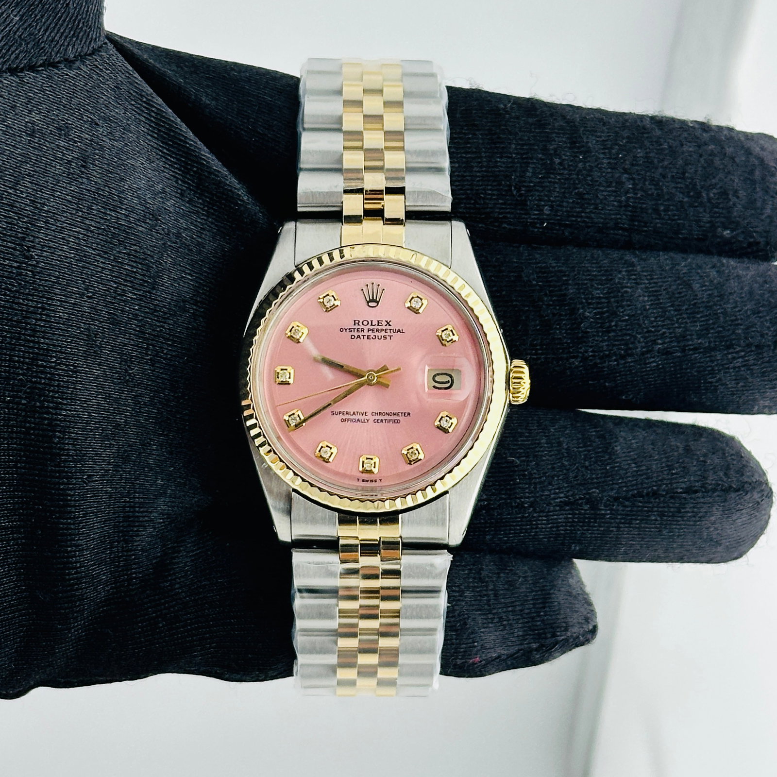 Rolex Datejust 1601 Mens Watch aftermarket Jubilee Bracelet Pink Diamond Dial: Rolex Datejust 1601 Mens Watch aftermarket Jubilee Bracelet Pink Diamond Dial Rolex Datejust reference 1601 with an Aftermarket pink dial featuring yellow diamond markers, a fluted bezel, and an After