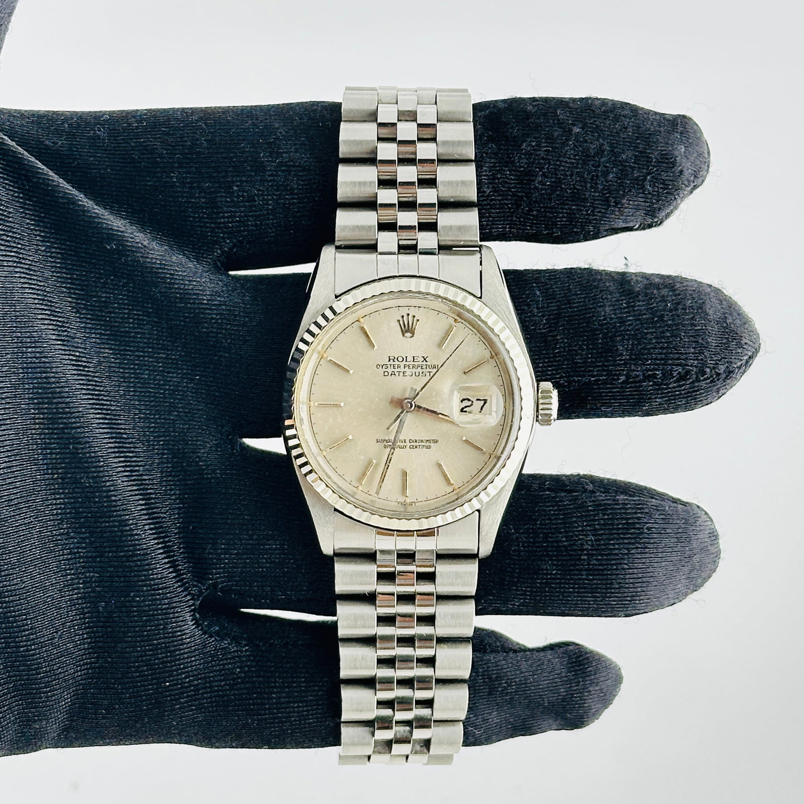 Rolex Datejust Ref 16014 Silver Dial Jubilee Bracelet: Rolex Datejust Ref 16014 Silver Dial Jubilee Bracelet This Rolex Datejust features a silver dial and is paired with a D-Link Jubilee bracelet. The watch has a fluted bezel and is identified by referen