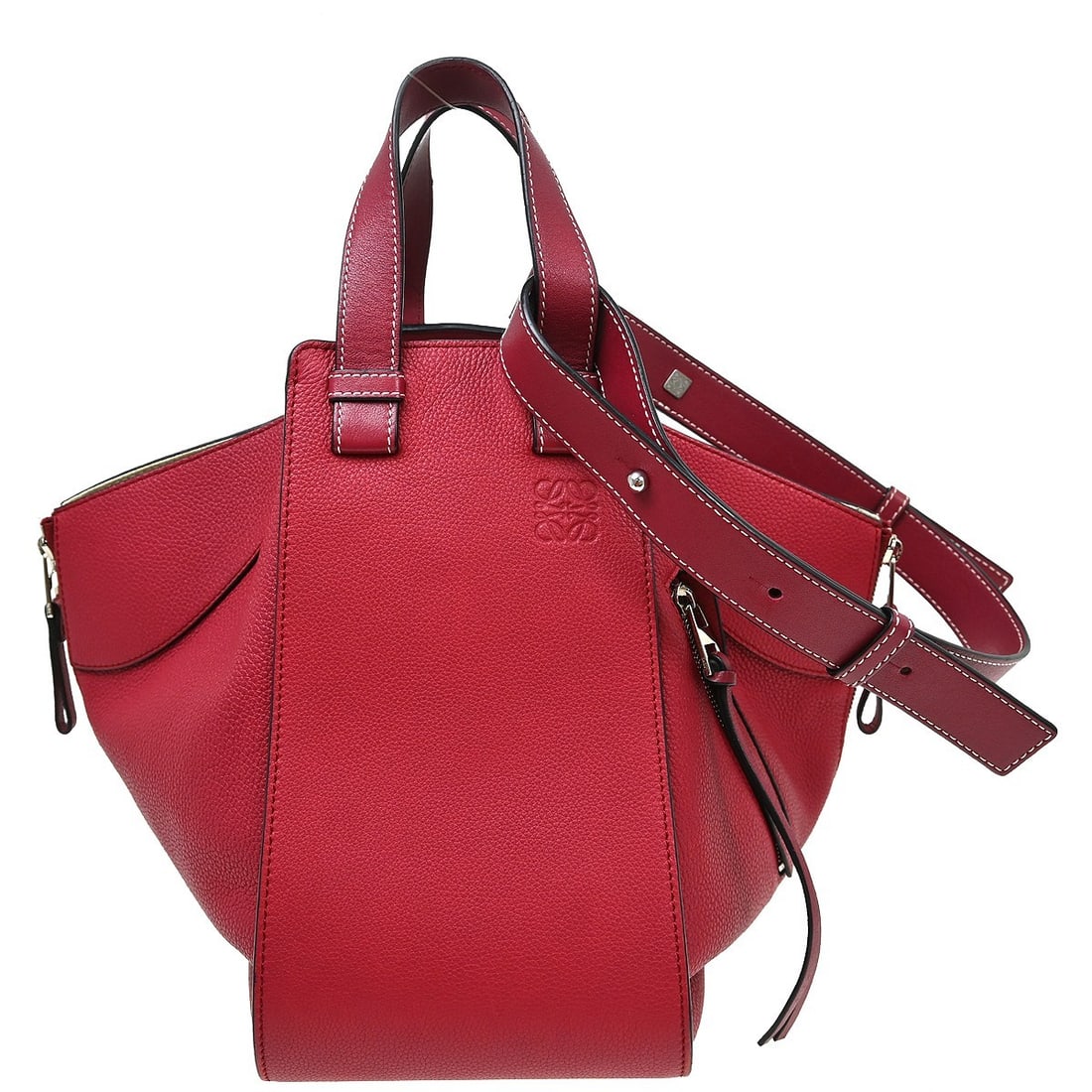Loewe Hammock Medium Pink Calfskin 2 Way Tote Bag: Loewe Hammock Medium Pink Calfskin 2 Way Tote Bag Loewe Hammock 2way tote handbag in pink calfskin with double handles and a removable shoulder strap. This medium women's bag features inner pockets an