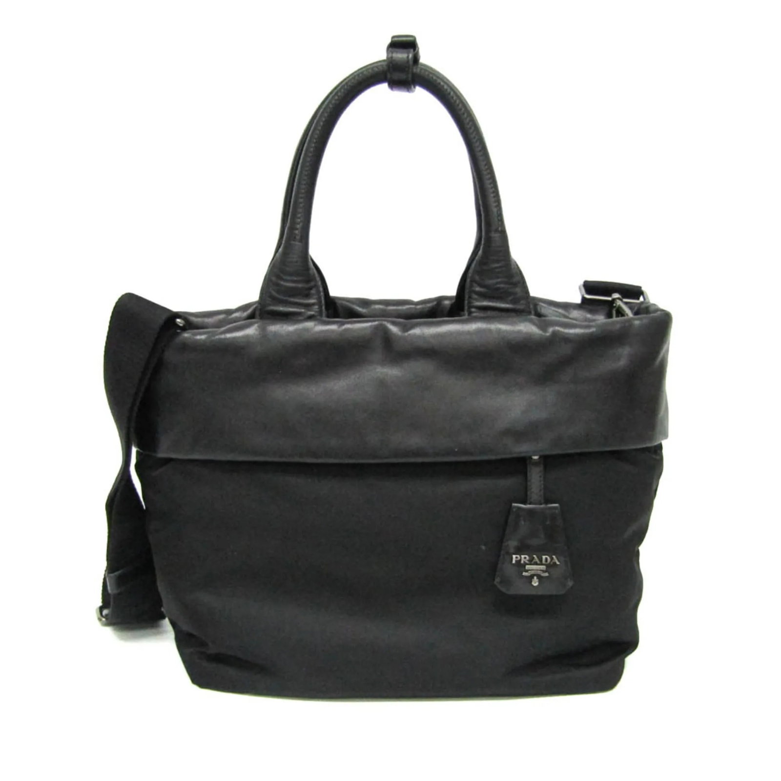 Prada Convertible Double Tote Black Nylon and Leather Bag 27cm: Prada Convertible Double Tote Black Nylon and Leather Bag 27cm This Prada Convertible Double Tote is crafted from durable nylon in classic black, designed for women. The bag features a versatile and s