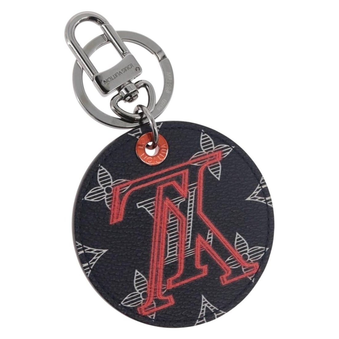 Louis Vuitton MP1988 Porte Cles LV Monogram Canvas Charm: Louis Vuitton MP1988 Porte Cles LV Monogram Canvas Charm Louis Vuitton Monogram Ink Upside Down Porte Cles LV charm in monogram canvas with a navy and monogram colorway. Made in France, this women's c