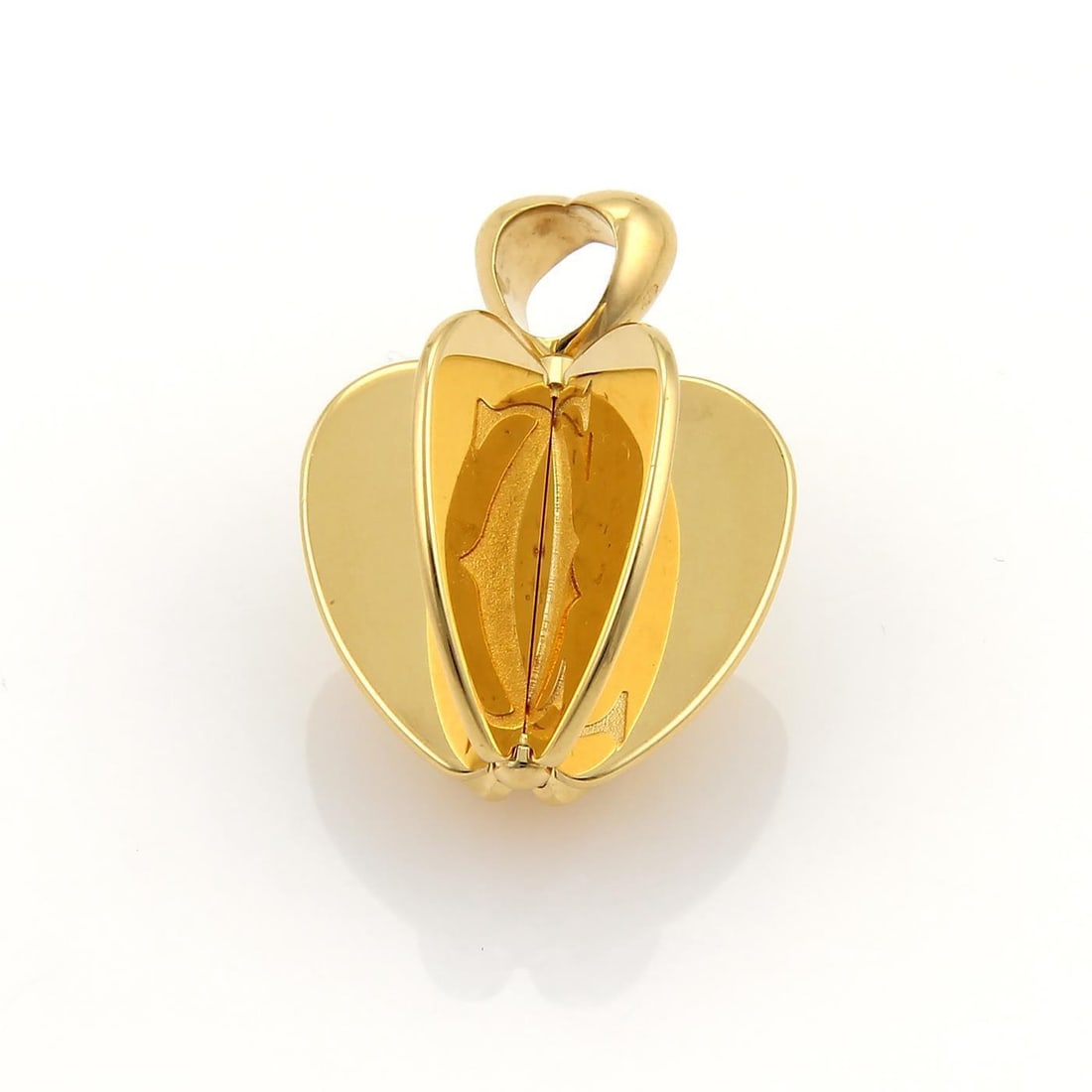 Cartier Double C 18k Yellow Gold Spinner Apple Pendant: Cartier Double C 18k Yellow Gold Spinner Apple Pendant Introducing the exquisite Cartier Double C 18k Yellow Gold 3D Spinner Apple Pendant. This authentic piece from the renowned DOUBLE C collection i