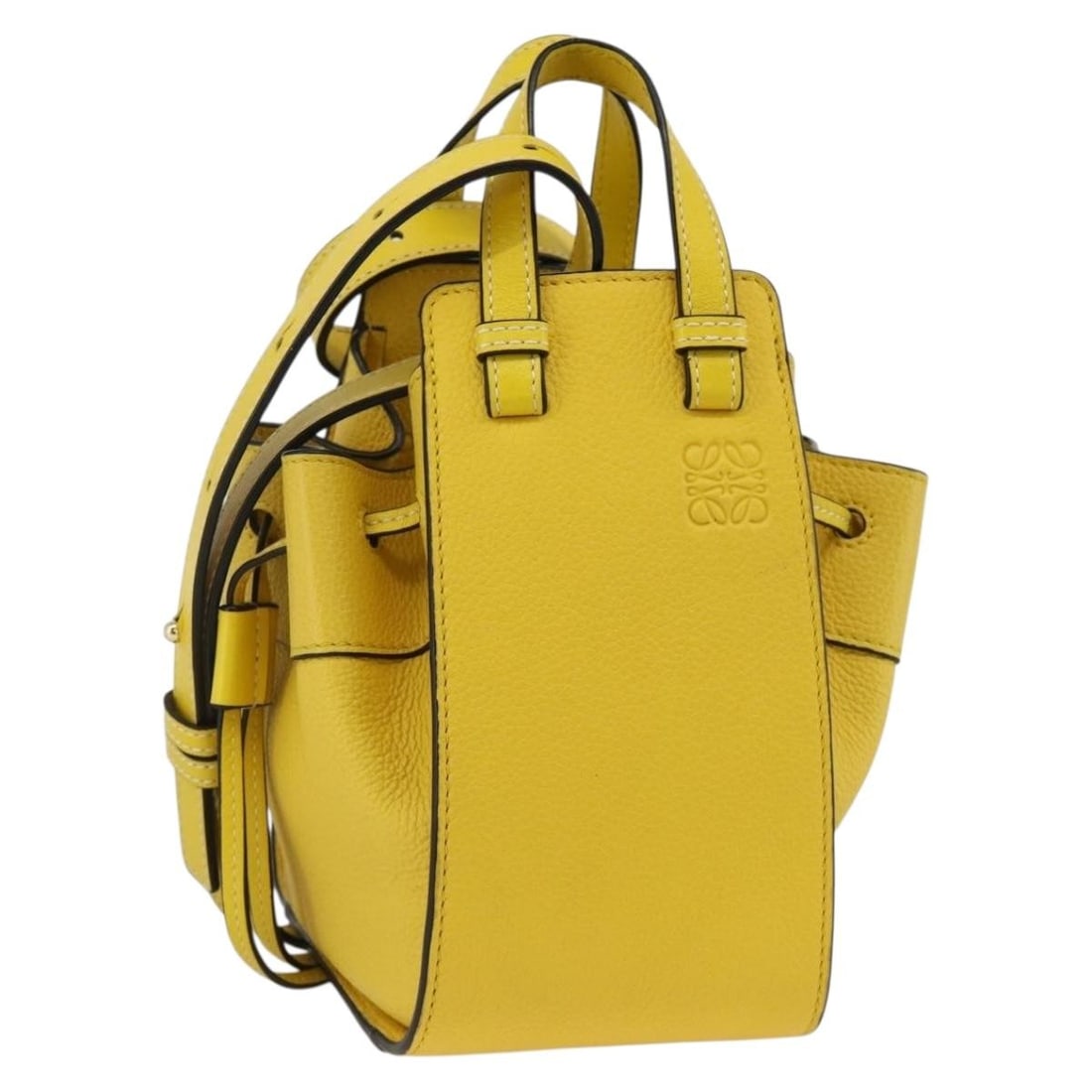 Loewe Yellow Leather Hammock Shoulder and Handbag with Dust Bag: Loewe Yellow Leather Hammock Shoulder and Handbag with Dust Bag This LOEWE Hammock hand bag is crafted from yellow leather and offers a versatile 2-way carrying style. Designed for women, the bag feat