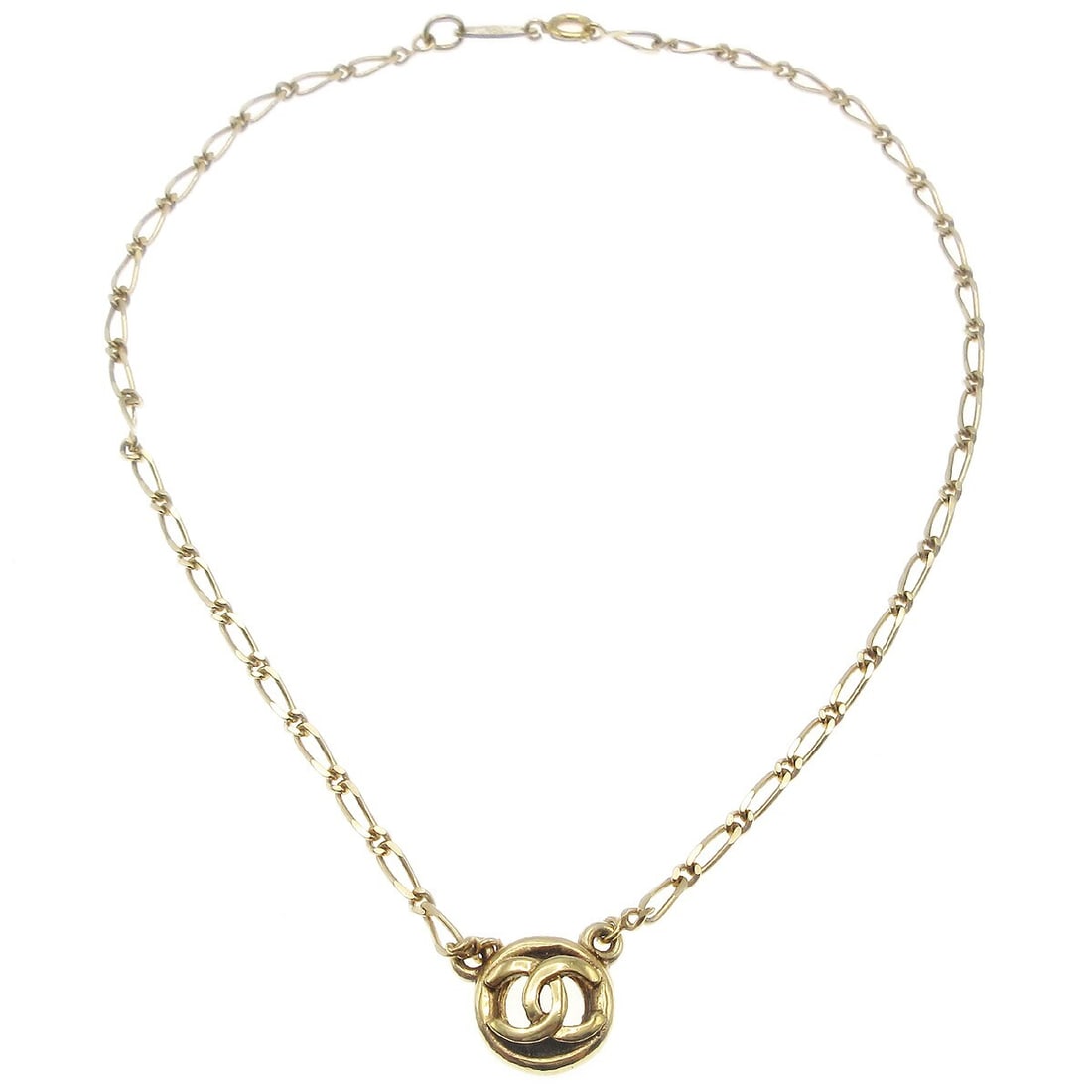 1983 Chanel medallion pendant necklace gold tone chain: 1983 Chanel medallion pendant necklace gold tone chain Vintage Chanel pendant necklace featuring a medallion charm on a gold-tone chain. Made in France, this 1983 piece has a classic pendant style wit