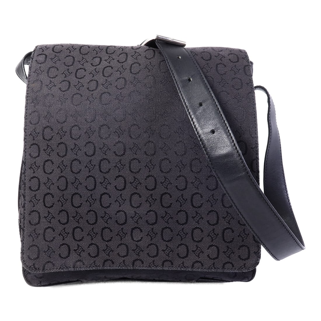 CELINE Vintage Black Canvas Shoulder Bag: CELINE Vintage Black Canvas Shoulder Bag This vintage CELINE shoulder bag features a classic black canvas construction, offering both durability and timeless style. Designed for men, the bag provides 