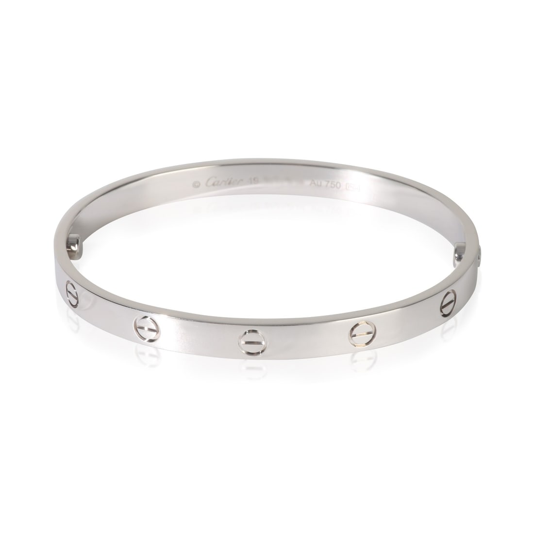 Cartier Love 18k White Gold Men's Bracelet with Box and Screwdriver: Cartier Love 18k White Gold Men's Bracelet with Box and Screwdriver This pre-owned Cartier Love bracelet is crafted from 18k white gold and features the iconic screw motif. Designed for men, it comes 