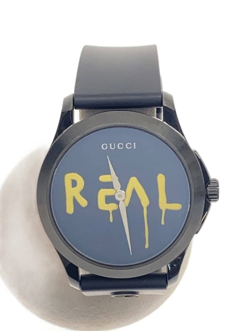 Gucci Ghost Quartz Black Rubber Men's Wristwatch: Gucci Ghost Quartz Black Rubber Men's Wristwatch This is a pre-owned GUCCI G-TIMELESS Ghost Quartz YA1264017 men's wristwatch. Featuring a black rubber material, the watch is Swiss-made and designed f