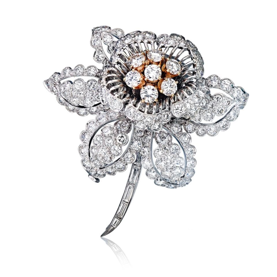 David Webb Flower Brooch Platinum 18K Yellow Gold 12.50 Carats Diamonds: David Webb Flower Brooch Platinum 18K Yellow Gold 12.50 Carats Diamonds This exquisite David Webb brooch showcases a stunning flower design, crafted from a combination of platinum and 18K yellow gold.