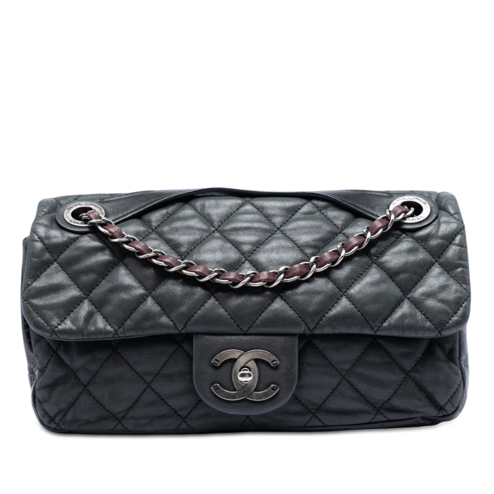 Chanel In The Mix Medium Flap Bag Iridescent Calfskin Black: Chanel In The Mix Medium Flap Bag Iridescent Calfskin Black This flap bag features an iridescent calfskin leather body with quilted detailing, a flat top handle, and a leather-woven chain strap. The f