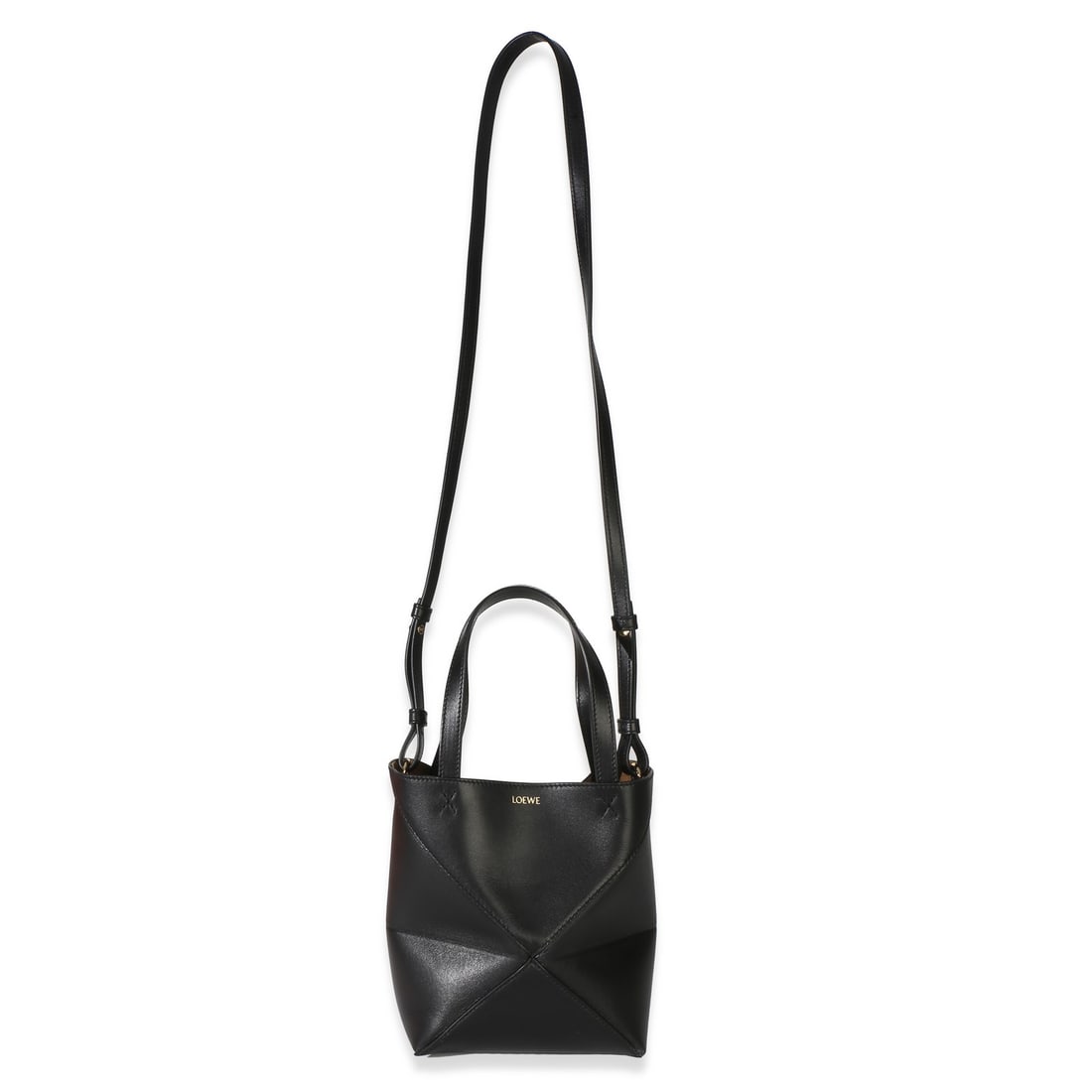 Loewe Mini Puzzle Fold Tote Black Leather Handbag: Loewe Mini Puzzle Fold Tote Black Leather Handbag This Loewe Mini Puzzle Fold Tote is crafted from black shiny calfskin leather and features a compact, structured silhouette. The bag is accented with 