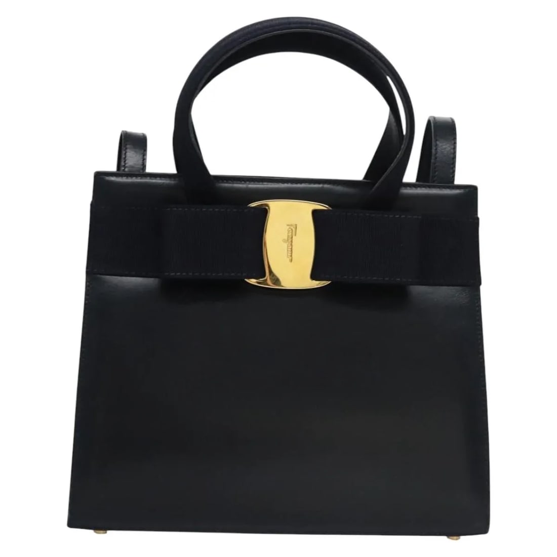 Salvatore Ferragamo Vara Bow Convertible Leather Tote Bag Navy: Salvatore Ferragamo Vara Bow Convertible Leather Tote Bag Navy Salvatore Ferragamo Convertible Vara Bow Tote in navy leather. This women's handbag is made in Italy and shows honest vintage wear consis