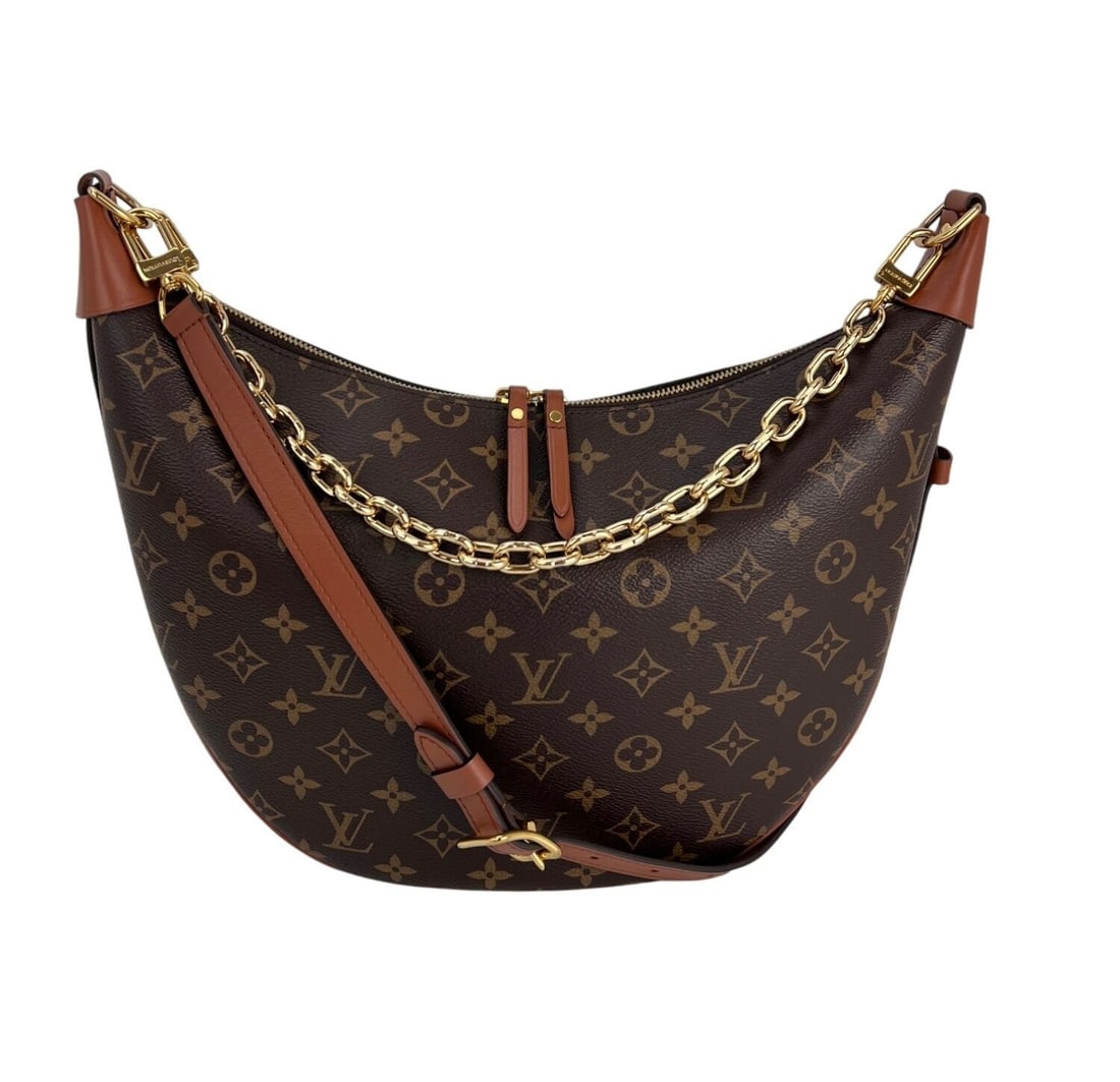 Louis Vuitton Loop Hobo Shoulder Bag Monogram Reverse Canvas: Louis Vuitton Loop Hobo Shoulder Bag Monogram Reverse Canvas Louis Vuitton Loop Hobo shoulder bag in Monogram Reverse coated canvas with a crescent silhouette. Designed with a zip closure, brown leath