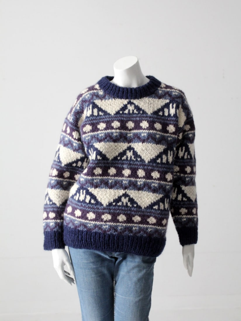 Vintage Chunky Knit Sweater Geometric Print Blue Purple White: Vintage Chunky Knit Sweater Geometric Print Blue Purple White Embrace cozy winter vibes with this vintage chunky knit sweater featuring a striking geometric print in blue, purple, and white. Crafted f