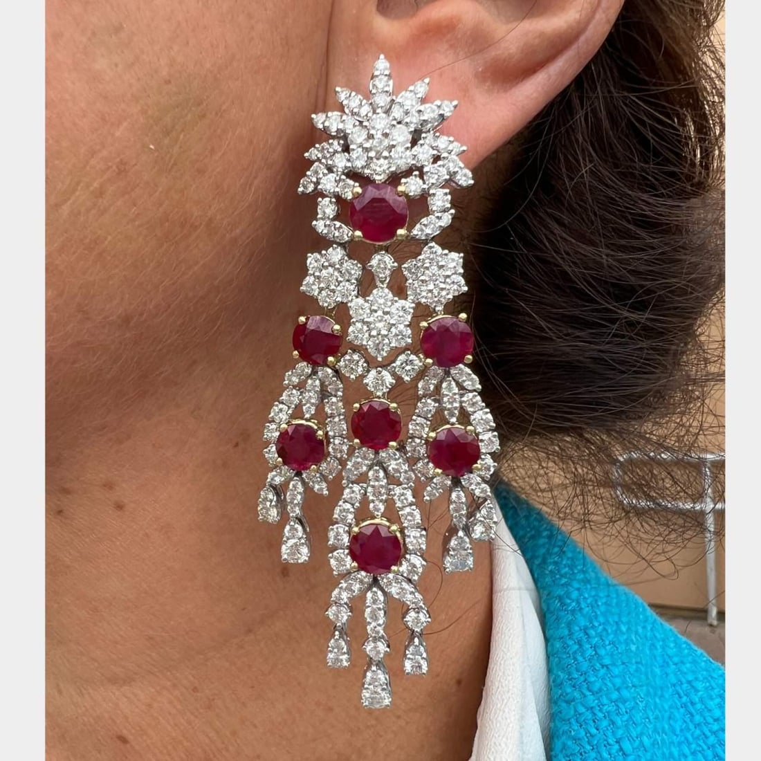 18K White Gold C. DUNAIGRE Ruby Diamond Earrings 16Ct: 18K White Gold C. DUNAIGRE Ruby Diamond Earrings 16Ct Elevate your elegance with these stunning 18K White Gold earrings featuring C. DUNAIGRE Certified Burma Rubies and sparkling diamonds. Weighing 57