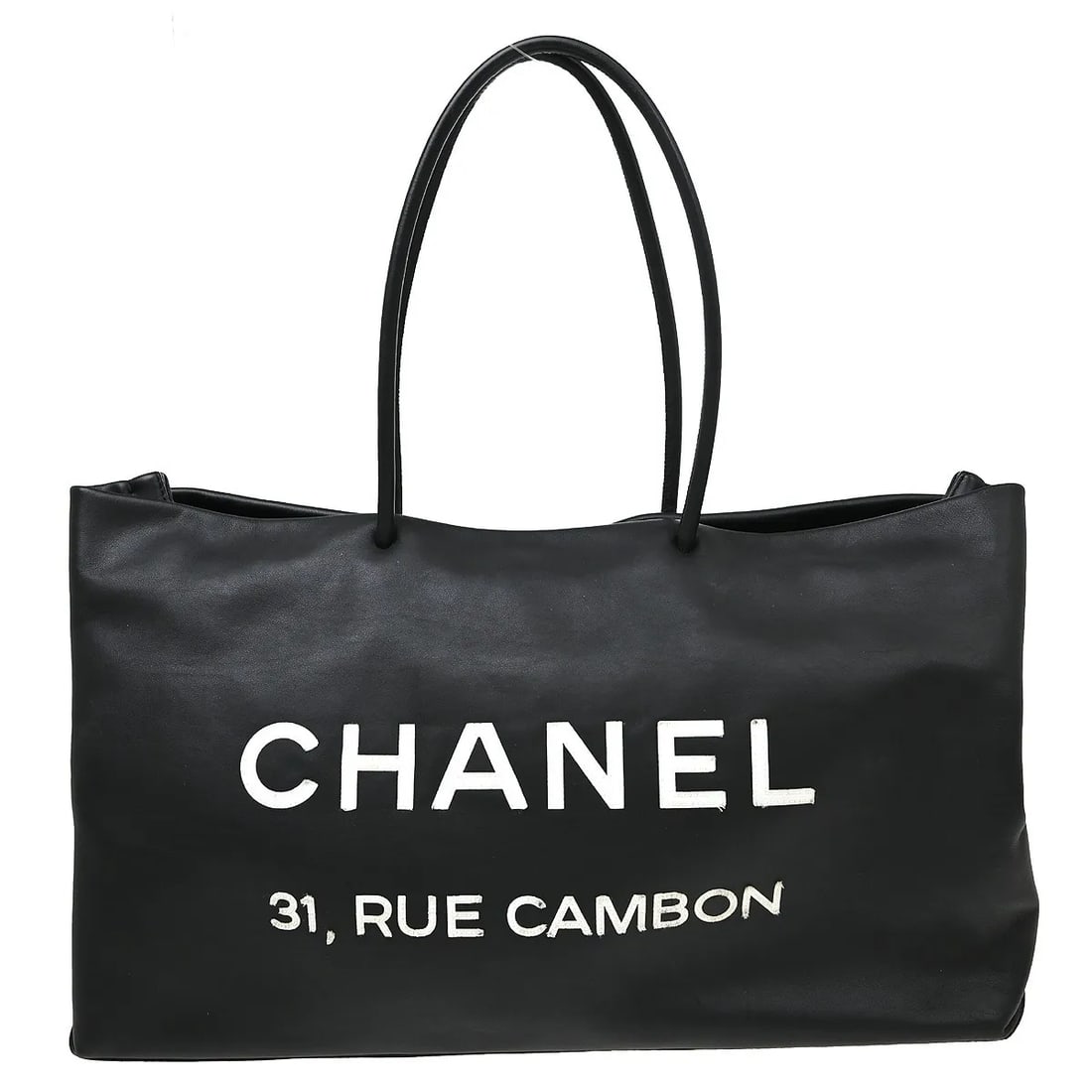 Chanel Essential 31 Rue Cambon Black Leather Tote Bag: Chanel Essential 31 Rue Cambon Black Leather Tote Bag Chanel Essential 31 Rue Cambon Shopping Tote in black leather. This women's tote is made in Italy and remains a practical everyday bag with a clas